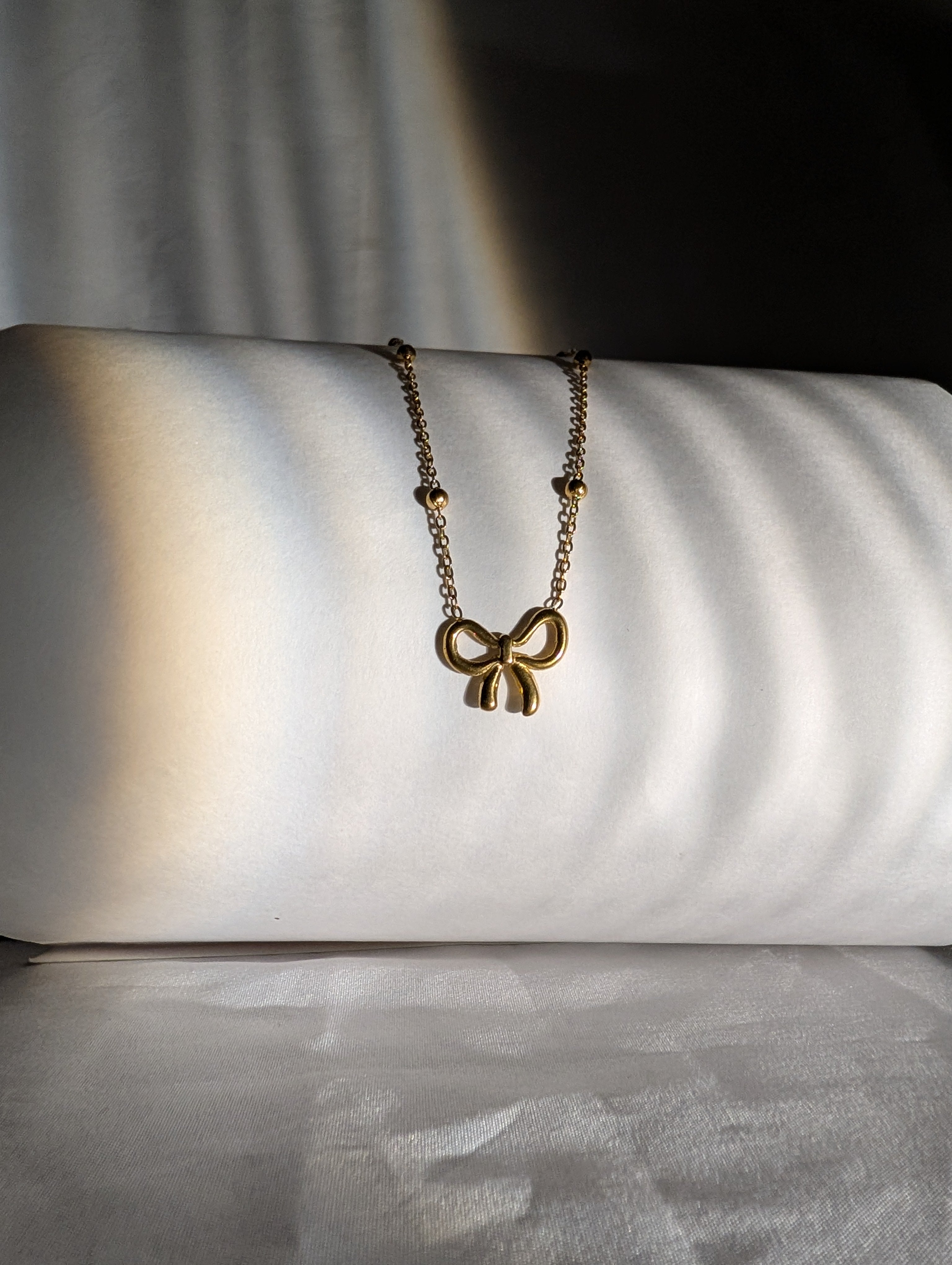 Anti-tarnish Gold bow Pendant