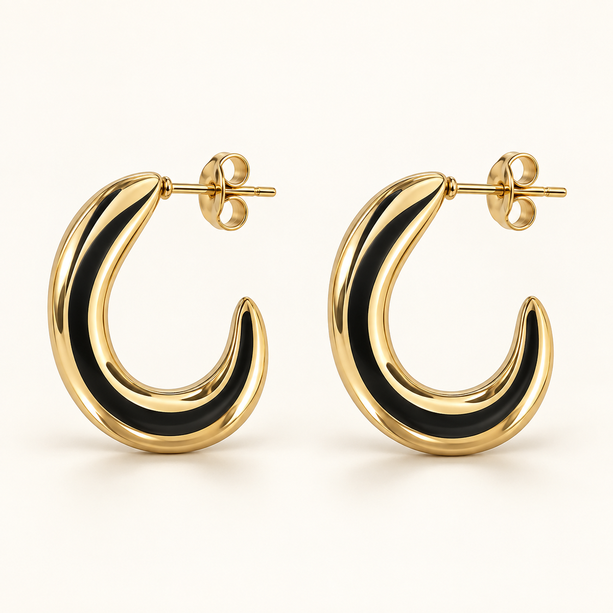 Black stripe C hoop earrings in gold tone