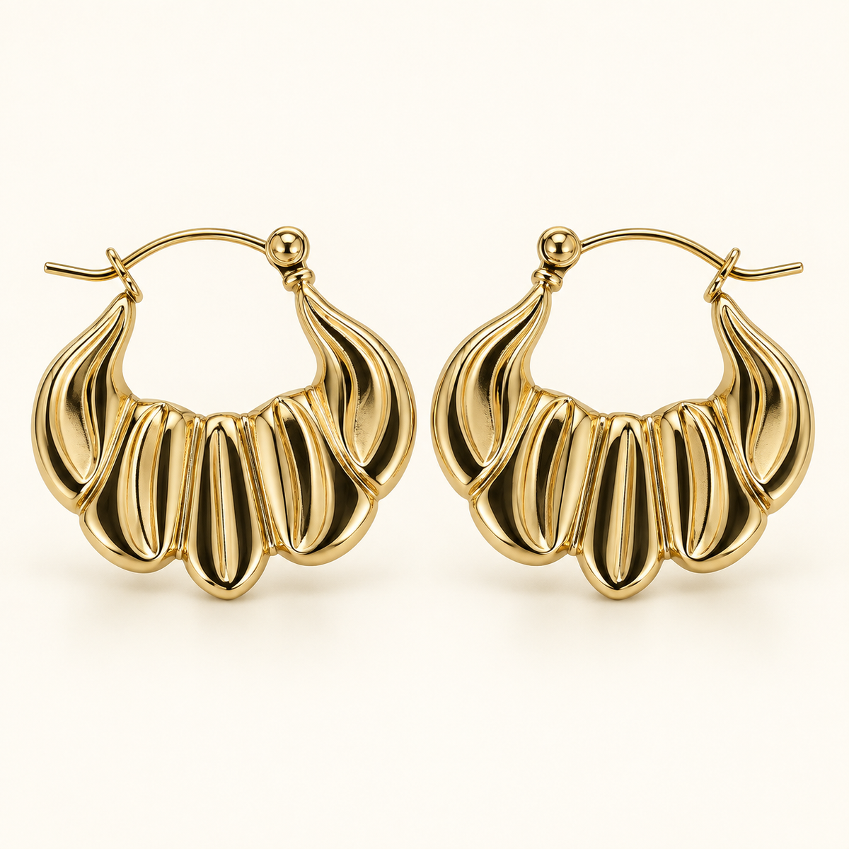 Botanical leaf hoop earrings in gold tone