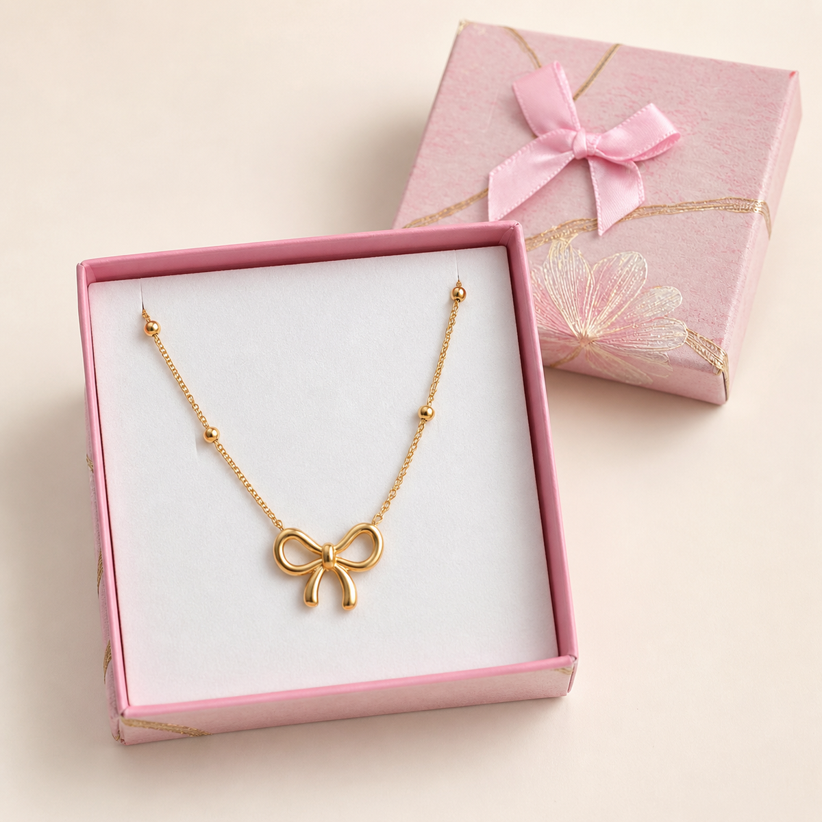 Anti-Tarnish Gold bow Pendant in a Pink Floral Box gift box