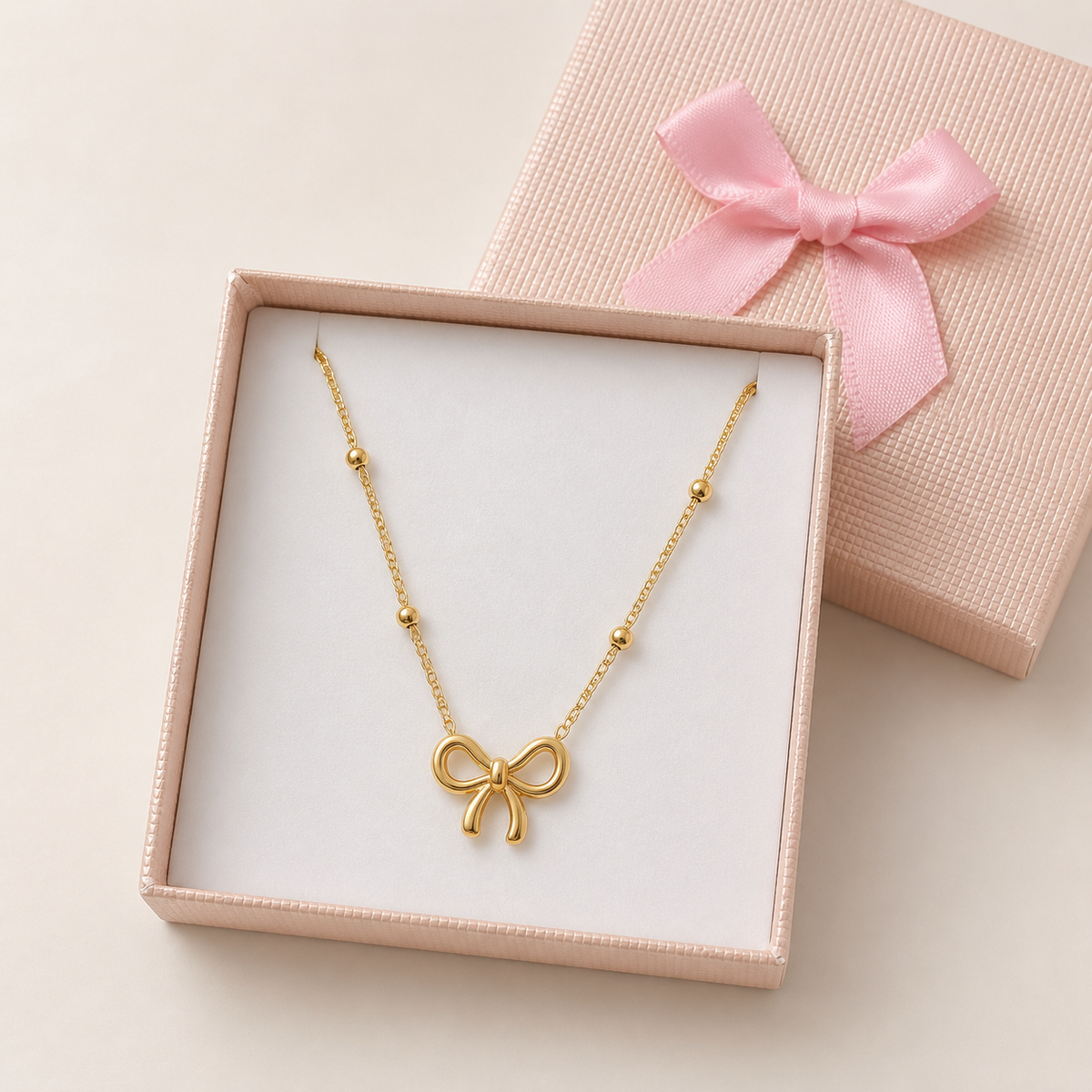 Anti-Tarnish Gold bow Pendant in a Cream Bow Box gift box