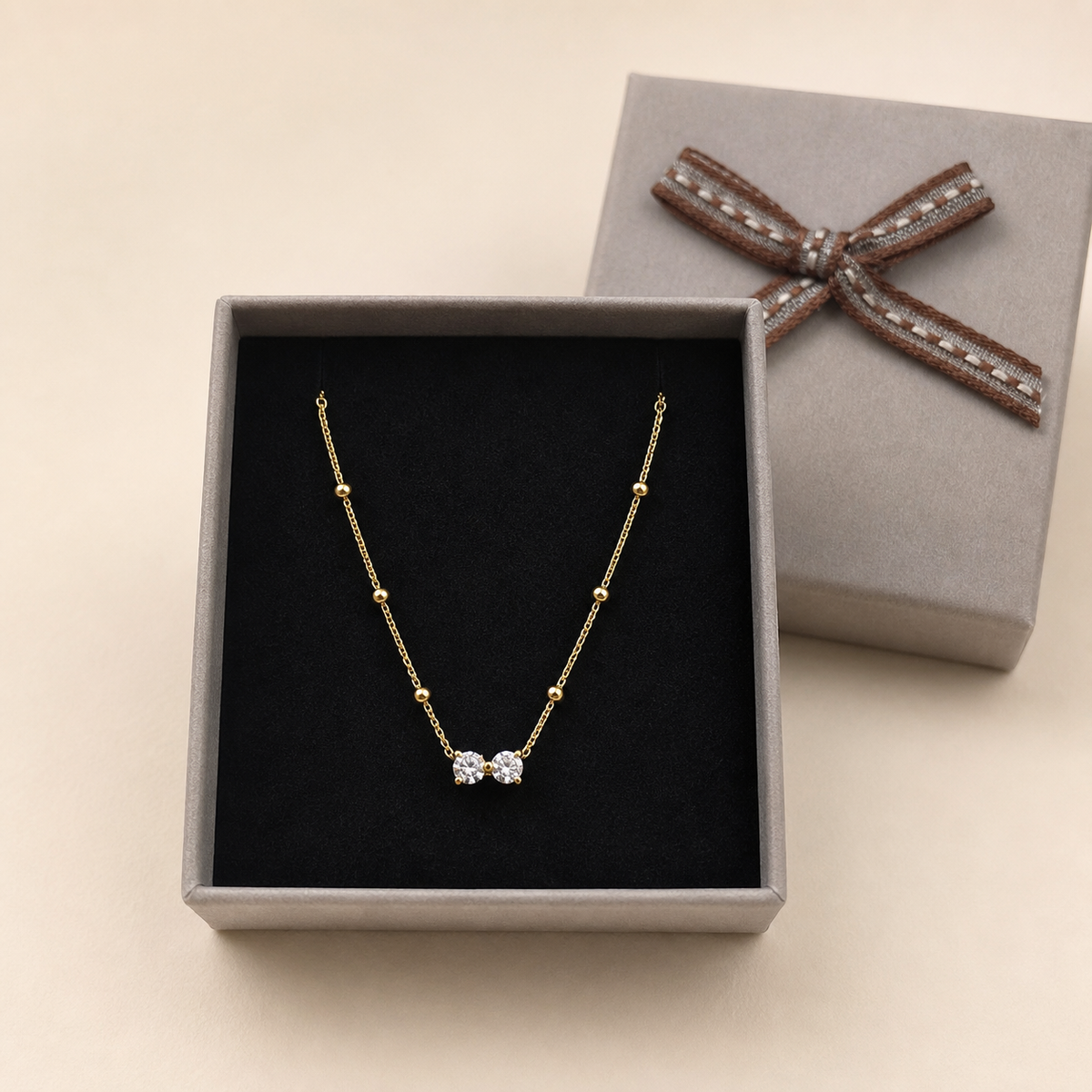 Anti-Tarnish Bow Pendant in a Grey Velvet Box gift box