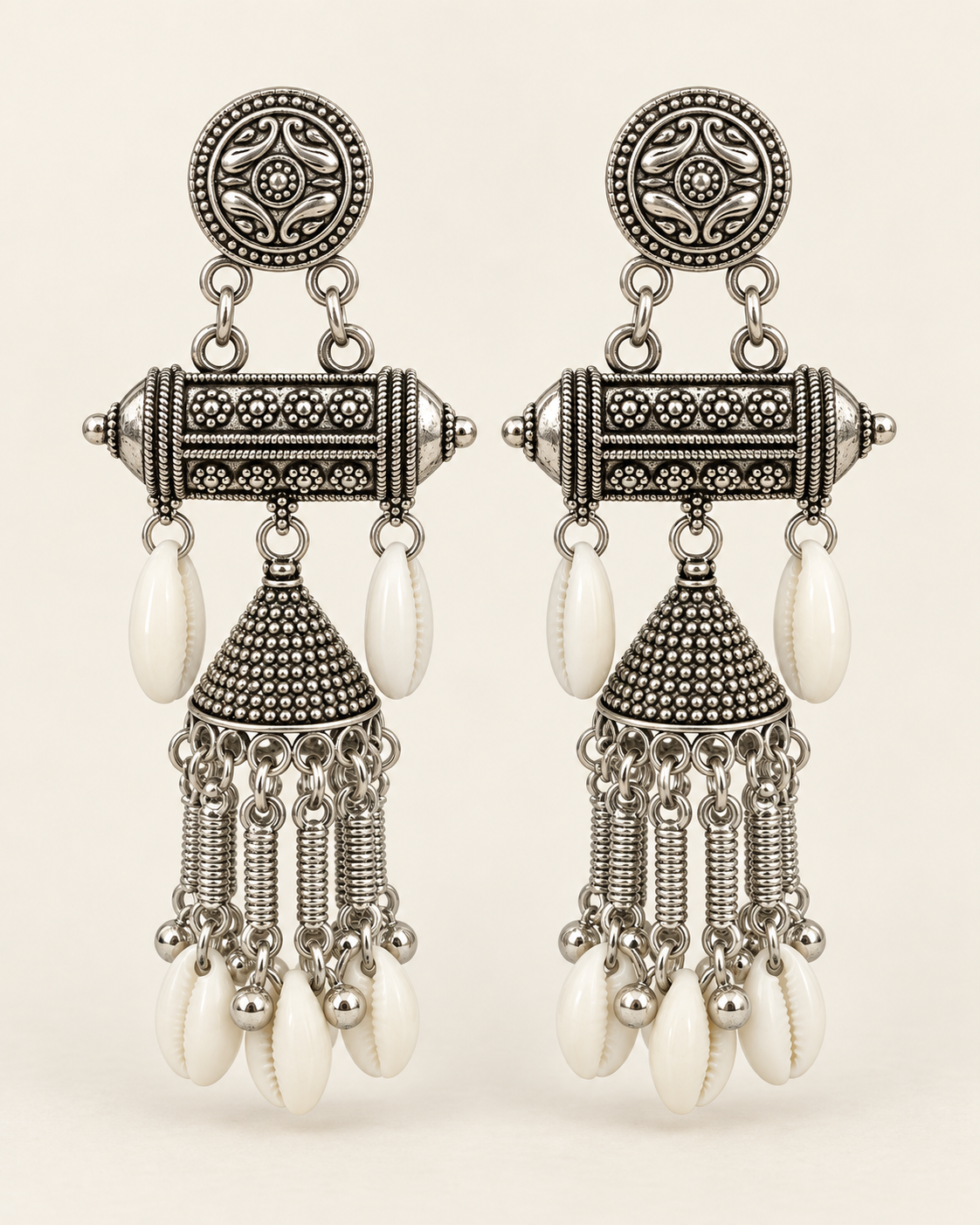 Oxidised silver barrel and cowrie jhumka earrings