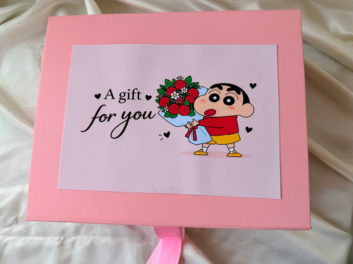 Closed pink gift box with Shinchan A gift for you lid artwork