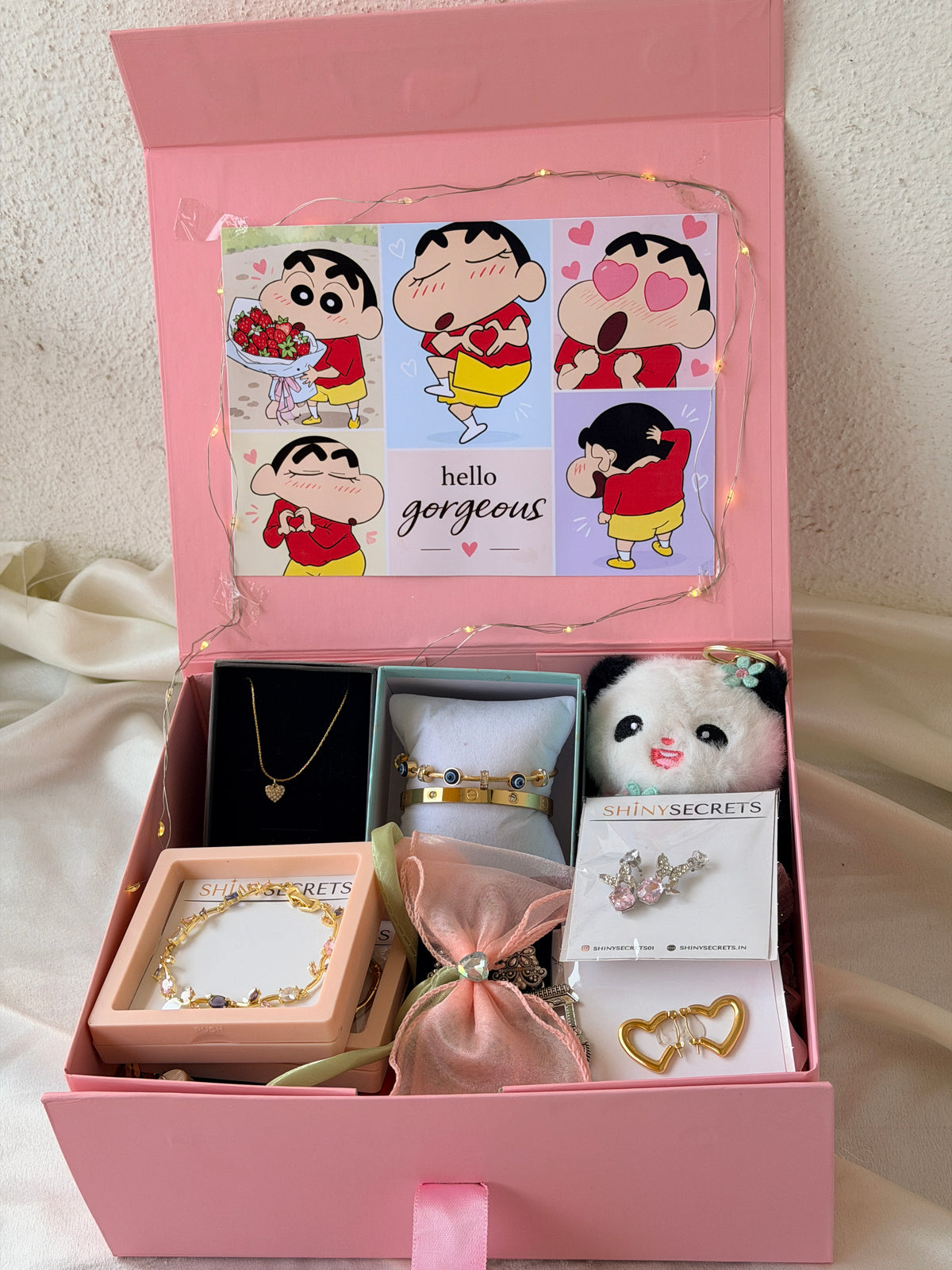 Original photograph of the open pink Shinchan gift hamper